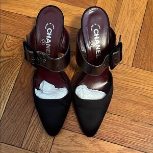 Chanel satin and leather mules.